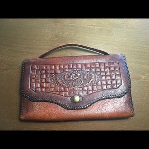 Antique leather clutch